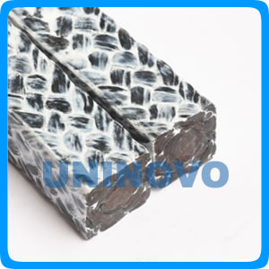 Carbonized fiber packing impregnated with PTFE